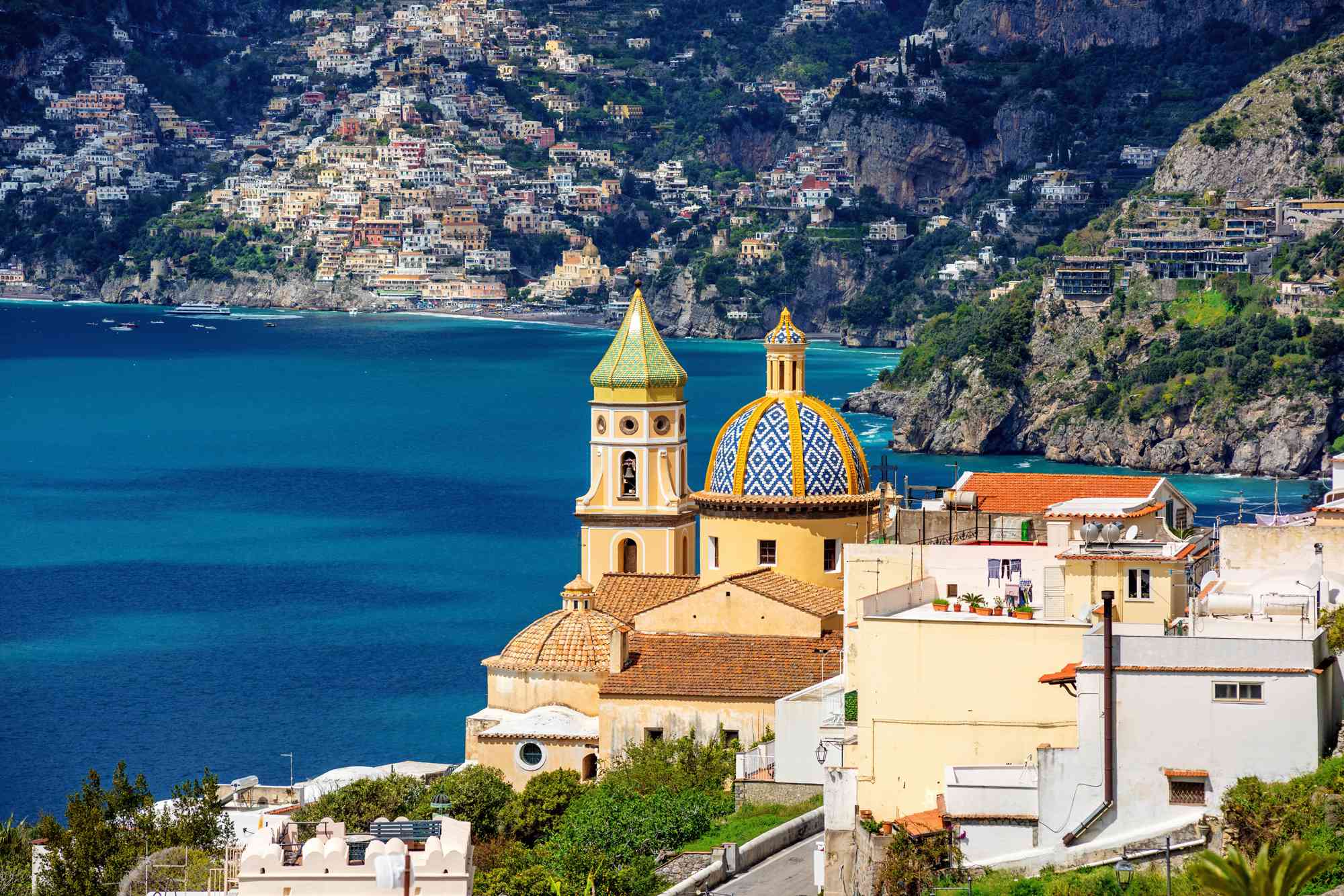 15 Most Beautiful Beach Towns Around the World, With Laid-back Charm and Postcard-worthy Views #Travel From a North Carolina barrier island to a coastal village on Japan’s Izu Peninsula, travel experts share their top picks.
