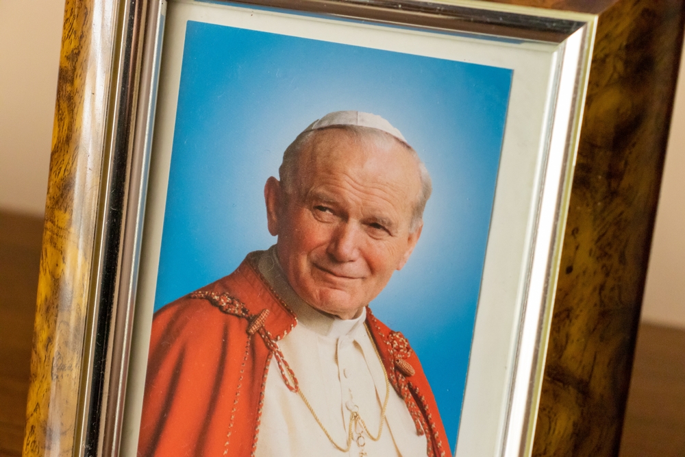 5 ways St. John Paul II changed the Catholic Church forever #Catholic You may know that St. John Paul II was the second-longest-serving pope in modern history with 27 years of pontificate, and he was the first non-Italian pontiff since the Dutch Pope Adrian VI in 1523.But did you know that he also changed the Catholic Church forever during those 27 years? Here are five ways he did that:1. He helped bring about the 1989 fall of communism in Eastern Europe.The pope’s official biographer, George Weigel, who for decades chronicled the pope’s engagement with civic leaders, noted that the way Pope John Paul II influenced the political landscape was enormous. His political influence is seen best in the way his engagement with world leaders assisted the downfall of the U.S.S.R.Just days before President Ronald Reagan called on Mikhail Gorbachev to “tear down” the Berlin Wall, he met with the pope. According to historian and author Paul Kengor, Reagan went so far as to call Pope John Paul II his “best friend,” opining that no one knew his soul better than the Polish pontiff who had also suffered an assassination attempt and carried the burden of world leadership.In the course of 38 official visits and 738 audiences and meetings held with heads of state, John Paul II influenced civic leaders around the world in this epic battle with a regime that would ultimately be responsible for the deaths of more than 30 million people.“He thought of himself as the universal pastor of the Catholic Church, dealing with sovereign political actors who were as subject to the universal moral law as anybody else,” Weigel said.“He was willing to be a risk-taker, but he also appreciated that prudence is the greatest of political virtues. And I think he was quite respected by world political leaders because of his transparent integrity. His essential attitude toward these men and women was: How can I help you? What can I do to help?”More than anything, John Paul II understood his role primarily as a spiritual leader.According to Weigel, the pope’s primary impact on the world of affairs was his central role in creating the revolution of conscience that began in Poland and swept across Eastern Europe. This revolution of conscience inspired the nonviolent revolution of 1989 and the collapse of communism in Central and Eastern Europe, an astounding political achievement.2. He beatified and canonized more saints than any predecessor, making holiness more accessible to ordinary people.One of John Paul II’s most enduring legacies is the huge number of saints he recognized. He celebrated 147 beatification ceremonies, during which he proclaimed 1,338 blesseds, and celebrated 51 canonizations for a total of 482 saints. That is more than the combined tally of his predecessors over the five centuries before.Mother Teresa of Calcutta is perhaps the best-known contemporary of John Paul II who is now officially a saint, but the first saint of the new millennium and one especially dear to John Paul II was St. Faustina Kowalska, the fellow Polish native who received the message of divine mercy.“Sister Faustina’s canonization has a particular eloquence: By this act I intend today to pass this message on to the new millennium,” he said in the homily of her canonization. “I pass it on to all people, so that they will learn to know ever better the true face of God and the true face of their brethren.”St. Pier Giorgio Frassati, whom Pope John Paul II beatified in 1990 and nicknamed the “Man of the Beatitudes,” is another popular saint elevated by the Polish pope who loved to recognize the holiness of simple persons living the call to holiness with extraordinary fidelity. At the time of his death, the 24-year-old Italian was simply a student with no extraordinary accomplishments. But his love for Christ in the Eucharist and in the poor was elevated by John Paul II as heroic and worthy of imitation. Frassati was canonized Sept. 7, 2025, by Pope Leo XIV.It bears noting that Pope Francis would later surpass John Paul II when he proclaimed 800 Italian martyrs as saints in a single day.3. He transformed the papal travel schedule.John Paul II visited some 129 countries during his pontificate — more countries than any other pope had visited up to that point.He also created World Youth Days in 1985 and presided over 19 of them as pope.Weigel said John Paul II understood that the pope must be present to the people of the Church, wherever they are.“He chose to do it by these extensive travels, which he insisted were not travels, they were pilgrimages,” Weigel said.“This was the successor of Peter, on pilgrimage to various parts of the world, of the Church. And that’s why these pilgrimages were always built around liturgical events, prayer, adoration of the holy Eucharist, ecumenical and interreligious gatherings — all of this was part of a pilgrimage experience.”In the latter half of the 20th century — a time of enormous social change and upheaval — John Paul II’s extensive travels and proclamation of the Gospel to the ends of the earth were just what the world needed, Weigel said.4. He made extraordinary contributions to Church teaching.John Paul II was a scholar who promulgated the Catechism of the Catholic Church in 1992, reformed the Eastern and Western Codes of Canon Law during his pontificate, and authored 14 encyclicals, 15 apostolic exhortations, 11 apostolic constitutions, and 45 apostolic letters.This is why Weigel said the Church has only begun to unpack what he calls the “magisterium” of John Paul II, in the form of his writings and his intellectual influence.For example, John Paul’s theology of the body remains enormously influential in the United States and throughout the world, though Weigel said even this has yet to be unpacked.5. He gave new life to the Catholic Church in Africa.John Paul II’s legendary evangelical fervor took fire in Africa.He had a particular friendship with Beninese Cardinal Bernardin Gantin and visited Africa many times. His visits would inspire a generation of JPII Catholics in Africa as well as other parts of the globe.“John Paul II was fascinated by Africa; he saw African Christianity as living, a kind of New Testament experience of the freshness of the Gospel, and he was very eager to support that, and lift it up,” Gantin said.“It was very interesting that during the two synods on marriage and the family in 2014 and 2015, some of the strongest defenses of the Church’s classic understanding of marriage and family came from African bishops. Some of whom are first-, second-generation Christians, deeply formed in the image of John Paul II, whom they regard as a model bishop,” Gantin said.“I think wherever you look around the world Church, the living parts of the Church are those that have accepted the magisterium … as the authentic interpretation of Vatican II. And the dying parts of the Church, the moribund parts of the Church are those parts that have ignored that magisterium.”John Paul II’s influence in Africa and around the globe transformed the world. It also forever transformed the Church.This story was first published on Oct. 22, 2021, and was updated Oct. 22, 2024, and again on Oct. 22, 2026. 5 ways St. John Paul II changed the Catholic Church forever #Catholic You may know that St. John Paul II was the second-longest-serving pope in modern history with 27 years of pontificate, and he was the first non-Italian pontiff since the Dutch Pope Adrian VI in 1523.But did you know that he also changed the Catholic Church forever during those 27 years? Here are five ways he did that:1. He helped bring about the 1989 fall of communism in Eastern Europe.The pope’s official biographer, George Weigel, who for decades chronicled the pope’s engagement with civic leaders, noted that the way Pope John Paul II influenced the political landscape was enormous. His political influence is seen best in the way his engagement with world leaders assisted the downfall of the U.S.S.R.Just days before President Ronald Reagan called on Mikhail Gorbachev to “tear down” the Berlin Wall, he met with the pope. According to historian and author Paul Kengor, Reagan went so far as to call Pope John Paul II his “best friend,” opining that no one knew his soul better than the Polish pontiff who had also suffered an assassination attempt and carried the burden of world leadership.In the course of 38 official visits and 738 audiences and meetings held with heads of state, John Paul II influenced civic leaders around the world in this epic battle with a regime that would ultimately be responsible for the deaths of more than 30 million people.“He thought of himself as the universal pastor of the Catholic Church, dealing with sovereign political actors who were as subject to the universal moral law as anybody else,” Weigel said.“He was willing to be a risk-taker, but he also appreciated that prudence is the greatest of political virtues. And I think he was quite respected by world political leaders because of his transparent integrity. His essential attitude toward these men and women was: How can I help you? What can I do to help?”More than anything, John Paul II understood his role primarily as a spiritual leader.According to Weigel, the pope’s primary impact on the world of affairs was his central role in creating the revolution of conscience that began in Poland and swept across Eastern Europe. This revolution of conscience inspired the nonviolent revolution of 1989 and the collapse of communism in Central and Eastern Europe, an astounding political achievement.2. He beatified and canonized more saints than any predecessor, making holiness more accessible to ordinary people.One of John Paul II’s most enduring legacies is the huge number of saints he recognized. He celebrated 147 beatification ceremonies, during which he proclaimed 1,338 blesseds, and celebrated 51 canonizations for a total of 482 saints. That is more than the combined tally of his predecessors over the five centuries before.Mother Teresa of Calcutta is perhaps the best-known contemporary of John Paul II who is now officially a saint, but the first saint of the new millennium and one especially dear to John Paul II was St. Faustina Kowalska, the fellow Polish native who received the message of divine mercy.“Sister Faustina’s canonization has a particular eloquence: By this act I intend today to pass this message on to the new millennium,” he said in the homily of her canonization. “I pass it on to all people, so that they will learn to know ever better the true face of God and the true face of their brethren.”St. Pier Giorgio Frassati, whom Pope John Paul II beatified in 1990 and nicknamed the “Man of the Beatitudes,” is another popular saint elevated by the Polish pope who loved to recognize the holiness of simple persons living the call to holiness with extraordinary fidelity. At the time of his death, the 24-year-old Italian was simply a student with no extraordinary accomplishments. But his love for Christ in the Eucharist and in the poor was elevated by John Paul II as heroic and worthy of imitation. Frassati was canonized Sept. 7, 2025, by Pope Leo XIV.It bears noting that Pope Francis would later surpass John Paul II when he proclaimed 800 Italian martyrs as saints in a single day.3. He transformed the papal travel schedule.John Paul II visited some 129 countries during his pontificate — more countries than any other pope had visited up to that point.He also created World Youth Days in 1985 and presided over 19 of them as pope.Weigel said John Paul II understood that the pope must be present to the people of the Church, wherever they are.“He chose to do it by these extensive travels, which he insisted were not travels, they were pilgrimages,” Weigel said.“This was the successor of Peter, on pilgrimage to various parts of the world, of the Church. And that’s why these pilgrimages were always built around liturgical events, prayer, adoration of the holy Eucharist, ecumenical and interreligious gatherings — all of this was part of a pilgrimage experience.”In the latter half of the 20th century — a time of enormous social change and upheaval — John Paul II’s extensive travels and proclamation of the Gospel to the ends of the earth were just what the world needed, Weigel said.4. He made extraordinary contributions to Church teaching.John Paul II was a scholar who promulgated the Catechism of the Catholic Church in 1992, reformed the Eastern and Western Codes of Canon Law during his pontificate, and authored 14 encyclicals, 15 apostolic exhortations, 11 apostolic constitutions, and 45 apostolic letters.This is why Weigel said the Church has only begun to unpack what he calls the “magisterium” of John Paul II, in the form of his writings and his intellectual influence.For example, John Paul’s theology of the body remains enormously influential in the United States and throughout the world, though Weigel said even this has yet to be unpacked.5. He gave new life to the Catholic Church in Africa.John Paul II’s legendary evangelical fervor took fire in Africa.He had a particular friendship with Beninese Cardinal Bernardin Gantin and visited Africa many times. His visits would inspire a generation of JPII Catholics in Africa as well as other parts of the globe.“John Paul II was fascinated by Africa; he saw African Christianity as living, a kind of New Testament experience of the freshness of the Gospel, and he was very eager to support that, and lift it up,” Gantin said.“It was very interesting that during the two synods on marriage and the family in 2014 and 2015, some of the strongest defenses of the Church’s classic understanding of marriage and family came from African bishops. Some of whom are first-, second-generation Christians, deeply formed in the image of John Paul II, whom they regard as a model bishop,” Gantin said.“I think wherever you look around the world Church, the living parts of the Church are those that have accepted the magisterium … as the authentic interpretation of Vatican II. And the dying parts of the Church, the moribund parts of the Church are those parts that have ignored that magisterium.”John Paul II’s influence in Africa and around the globe transformed the world. It also forever transformed the Church.This story was first published on Oct. 22, 2021, and was updated Oct. 22, 2024, and again on Oct. 22, 2026.