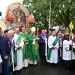 Faith and tradition unite Peruvians at Paterson Mass #Catholic – Bishop Kevin J. Sweeney helped the Peruvian community from across the diocese celebrate the feast of Señor de los Milagros (Lord of Miracles) during a Spanish Mass on Oct. 11 at the Cathedral of St. John the Baptist in Paterson, N.J., the mother church of the Paterson Diocese.
Bishop Kevin J. Sweeney concelebrated the liturgy with Msgr. Geno Sylva, rector of St. John’s and diocesan vicar for special projects. The Children’s Choir sang hymns of praise.
The Peruvian devotion features an outdoor procession through the streets to the Lord and all his miracles. Peruvians carried an image of Jesus Christ that was painted during the 17th century by an unknown African who was taken as an enslaved person from what is now Angola to Peru. The procession also includes an image of the Blessed Virgin Mary.
The Peruvian community celebrates Señor de los Milagros every October, on or near the 18th. It is the leading Catholic celebration in Peru, and it features one of the largest processions in the world in the South American country. Its name originated in the 17th century during an earthquake in Lima that destroyed most of the city, leaving only the image standing.
BEACON PHOTOS | JOE GIGLI
 [See image gallery at beaconnj.org] 

Click here to subscribe to our weekly newsletter.