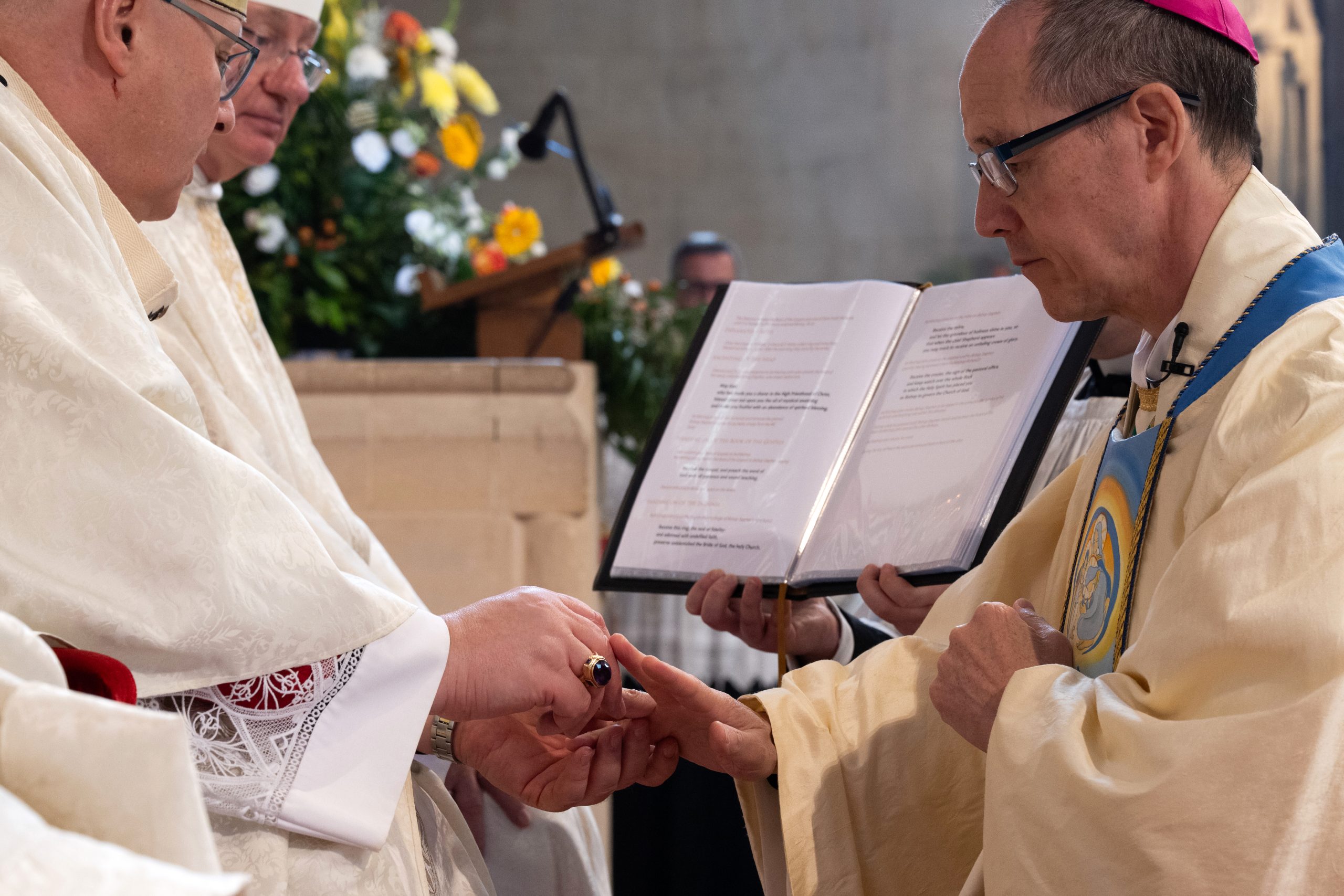 From rector in Rome to bishop in England, Stephen Wang embraces new mission of truth and love – #Catholic – Following Pope Leo XIV’s announcement in July, Father Stephen Wang became the sixth bishop of the Diocese of Arundel and Brighton on Oct. 19 at the Cathedral of Our Lady and St. Philip Howard in England.
Bishop Stephen Wang is ordained the sixth bishop of Arundel and Brighton in England on Oct. 19, 2026, after serving as rector of the Venerable English College in Rome. | Credit: ©Mazur/cbcew.org.uk
The milestone event at the cathedral in West Sussex gathered key figures across the community — from Archbishop Miguel Maury Buendía, the papal nuncio to Great Britain, to local priests, religious orders, and lay Catholics — alongside representatives from neighboring Christian churches as well as the Muslim, Jewish, and Hindu traditions, all standing together to mark this new chapter for the diocese.Reflecting on his personal faith journey, Wang recalled converting to Catholicism decades prior in Harpenden, England. He shared how an icon given to him by a friend during his youth — inscribed with St. Paul’s reassurance that the Lord is faithful and will bring all things to fulfillment — has continually guided his vocation.
Stephen Wang lies prostrate during his ordination as the sixth bishop of Arundel and Brighton in England on Oct. 19, 2026, after serving as rector of the Venerable English College in Rome. | Credit: ©Mazur/cbcew.org.uk
When addressing the congregation after the ordination Mass, Wang announced his episcopal motto as “Veritas in Caritate,” from St. Paul’s letter to the Ephesians: “to speak the truth in love.” He said this phrase has inspired his whole priesthood — from his teenage conversion to his time in London when he launched the faith formation program “Sycamore” in 2014 and his appointment in Rome as rector of the Venerable English College (VEC).
Bishop Stephen Wang elevates the host during the consecration at the Mass where he became the sixth bishop of Arundel and Brighton in England on Oct. 19, 2026. | Credit: ©Mazur/cbcew.org.uk
Wang has a deep, multilayered history with the VEC in Rome, having spent time there both as a student and later returning as its rector. From 1992 to 1997, he completed his initial priestly formation at the seminary, earning a licentiate in philosophy from the college alongside a licentiate in fundamental theology from the Pontifical Gregorian University. Decades later, he returned to Rome to serve as rector of the VEC from 2021 until 2026, where he oversaw the preparation and formation of the next generation of Catholic priests before stepping down upon his new appointment as the bishop of Arundel and Brighton.In his closing statement, newly ordained Wang said: “It’s not about us, it’s about God, his faithfulness, his love, a beauty that catches us by surprise.” From rector in Rome to bishop in England, Stephen Wang embraces new mission of truth and love – #Catholic – Following Pope Leo XIV’s announcement in July, Father Stephen Wang became the sixth bishop of the Diocese of Arundel and Brighton on Oct. 19 at the Cathedral of Our Lady and St. Philip Howard in England.
Bishop Stephen Wang is ordained the sixth bishop of Arundel and Brighton in England on Oct. 19, 2026, after serving as rector of the Venerable English College in Rome. | Credit: ©Mazur/cbcew.org.uk
The milestone event at the cathedral in West Sussex gathered key figures across the community — from Archbishop Miguel Maury Buendía, the papal nuncio to Great Britain, to local priests, religious orders, and lay Catholics — alongside representatives from neighboring Christian churches as well as the Muslim, Jewish, and Hindu traditions, all standing together to mark this new chapter for the diocese.Reflecting on his personal faith journey, Wang recalled converting to Catholicism decades prior in Harpenden, England. He shared how an icon given to him by a friend during his youth — inscribed with St. Paul’s reassurance that the Lord is faithful and will bring all things to fulfillment — has continually guided his vocation.
Stephen Wang lies prostrate during his ordination as the sixth bishop of Arundel and Brighton in England on Oct. 19, 2026, after serving as rector of the Venerable English College in Rome. | Credit: ©Mazur/cbcew.org.uk
When addressing the congregation after the ordination Mass, Wang announced his episcopal motto as “Veritas in Caritate,” from St. Paul’s letter to the Ephesians: “to speak the truth in love.” He said this phrase has inspired his whole priesthood — from his teenage conversion to his time in London when he launched the faith formation program “Sycamore” in 2014 and his appointment in Rome as rector of the Venerable English College (VEC).
Bishop Stephen Wang elevates the host during the consecration at the Mass where he became the sixth bishop of Arundel and Brighton in England on Oct. 19, 2026. | Credit: ©Mazur/cbcew.org.uk
Wang has a deep, multilayered history with the VEC in Rome, having spent time there both as a student and later returning as its rector. From 1992 to 1997, he completed his initial priestly formation at the seminary, earning a licentiate in philosophy from the college alongside a licentiate in fundamental theology from the Pontifical Gregorian University. Decades later, he returned to Rome to serve as rector of the VEC from 2021 until 2026, where he oversaw the preparation and formation of the next generation of Catholic priests before stepping down upon his new appointment as the bishop of Arundel and Brighton.In his closing statement, newly ordained Wang said: “It’s not about us, it’s about God, his faithfulness, his love, a beauty that catches us by surprise.”