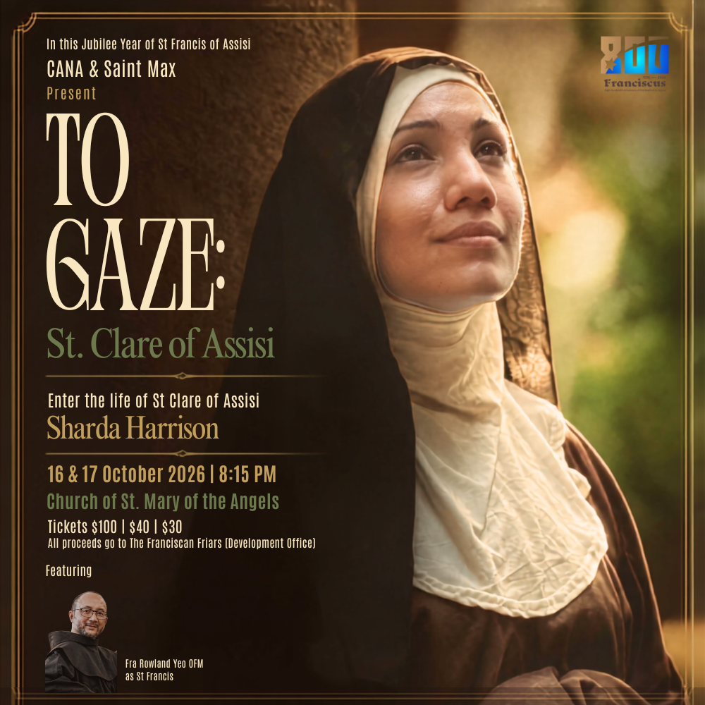 In a wealthy Asian city, a play asks why St. Clare of Assisi chose to own nothing #Catholic SINGAPORE — St. Clare of Assisi, as she appears on a church stage in Singapore this week, opens her story with a list of what her family owned. “We had money, we had servants … we had horses,” she tells the audience. “We had everything, but for a girl like me, my life was already written for me.”The line comes early in “TO GAZE: St. Clare of Assisi,” performed Oct. 16 and 17 at the Church of St. Mary of the Angels, a Catholic parish in Bukit Batok in western Singapore served by Franciscan friars.
The official poster for “TO GAZE: St. Clare of Assisi,” presented by CANA and Saint Max in Singapore Oct. 16–17, 2026, for the Jubilee Year of St. Francis, with Sharda Harrison as St. Clare and Fra Rowland Yeo, OFM, as St. Francis. | Credit: Courtesy of CANA and Saint Max
Presented by CANA, a faith-based community and cultural hub in Singapore, and Saint Max, the production is part of the celebrations of the Jubilee Year of St. Francis of Assisi, which the worldwide Franciscan family has held to mark 800 years since Francis died in October 1226.Actress Sharda Harrison wrote the script and plays the role of Clare; according to the organizers, she also directed the show. Fra Rowland Yeo, OFM, a Franciscan friar, plays St. Francis, and the productionʼs poster says all proceeds go to the development office of the Franciscan friars.
Fra Michael D’Cruz, OFM, welcomes the audience before the performance Oct. 16, 2026, in Singapore. | Credit: Benedict Tang
An organizer from CANA who asked not to be named said that after a year of jubilee celebrations for Francis, the play was a fitting way to close the celebration with “the precious legacy of St. Clare.” The group turned to Harrison, the organizer said, because she had portrayed St. Thérèse of Lisieux for them in 2024 in “St. Thérèse: The Little Way,” a play she also wrote and directed.Asked what audiences should take home, the organizer answered with a question: “Why is poverty a privilege? … Why is this crazy lady Clare so resolved to live it?” The second and last performance falls on Oct. 17, the United Nations' International Day for the Eradication of Poverty.
Sharda Harrison, barefoot, addresses the audience as St. Clare at the first performance of “TO GAZE: St. Clare of Assisi,” Oct. 16, 2026. | Credit: Benedict Tang
Medieval marriage, modern ‘swiping’In a city-state where Catholics live alongside Buddhists, Muslims, Hindus, Taoists, and others, the script reaches for references from everyday modern life. When Clareʼs father looks for a husband for her, suitors appear on a large screen: Guido, Bernardo, and Silvestro, “my fatherʼs favorite.” Clare asks the audience to vote. “In your time … you swipe right if you like the boy, and you swipe left if you donʼt like the boy,” she says.The comedy gives way to the turning point of her life. Clare describes Francis as a merchantʼs son “born into wealth just like me.” She says: “I realized that I had everything, but I wanted none of it.” She slips out of her family home on Palm Sunday night, has her hair cut before Francis, and faces her furious father: “I belong to Christ now, Father.”It is not a one-woman show. Other actors play Clareʼs companions and the early friars, and Clare pulls women from the audience into the story, choosing them as “sisters” and giving them vows as her community grows.
Clare’s hair is cut as she gives up her life of privilege, with Fra Rowland Yeo, OFM, as St. Francis, at a performance in Singapore on Oct. 16, 2026. | Credit: Benedict Tang
‘The right to possess nothing’Poverty runs through the script. Clare recalls that her mother, Ortolana, “saw God everywhere, especially in the poor,” and adds: “They were not hidden like today.”“This is what it means to live in the privilege of poverty,” she says, “to be given the right to possess nothing.” The world, she tells them, “did not understand. Not even the Church.”The title of the play echoes Clareʼs letters to St. Agnes of Prague, a princess who, in the playʼs words, “decided to give up everything to become a poor lady.” In welcoming remarks before the curtain, Fra Michael DʼCruz, OFM, the Franciscan friar overseeing the event for the parish, quoted those letters and described how the two saints, Clare and Francis, worked together. “Francis was the voice; Clare was the quiet powerhouse of prayer,” he said.Near the end, Clare looks back on a life of refusals. “Perhaps saying no was never the whole point,” she says. “I had to learn how to say yes, yes to Christ, yes to poverty.”After the cast took their bow on opening night, Harrison dropped Clareʼs Italian accent to thank those present “for wanting to be here to listen to Clareʼs story,” promising “a bigger, grander farewell” for the last night.St. Clare died in 1253 at San Damiano, near Assisi, Italy, her home “for the next 40 years,” as she says in the script. In a wealthy Asian city, a play asks why St. Clare of Assisi chose to own nothing #Catholic SINGAPORE — St. Clare of Assisi, as she appears on a church stage in Singapore this week, opens her story with a list of what her family owned. “We had money, we had servants … we had horses,” she tells the audience. “We had everything, but for a girl like me, my life was already written for me.”The line comes early in “TO GAZE: St. Clare of Assisi,” performed Oct. 16 and 17 at the Church of St. Mary of the Angels, a Catholic parish in Bukit Batok in western Singapore served by Franciscan friars.
The official poster for “TO GAZE: St. Clare of Assisi,” presented by CANA and Saint Max in Singapore Oct. 16–17, 2026, for the Jubilee Year of St. Francis, with Sharda Harrison as St. Clare and Fra Rowland Yeo, OFM, as St. Francis. | Credit: Courtesy of CANA and Saint Max
Presented by CANA, a faith-based community and cultural hub in Singapore, and Saint Max, the production is part of the celebrations of the Jubilee Year of St. Francis of Assisi, which the worldwide Franciscan family has held to mark 800 years since Francis died in October 1226.Actress Sharda Harrison wrote the script and plays the role of Clare; according to the organizers, she also directed the show. Fra Rowland Yeo, OFM, a Franciscan friar, plays St. Francis, and the productionʼs poster says all proceeds go to the development office of the Franciscan friars.
Fra Michael D’Cruz, OFM, welcomes the audience before the performance Oct. 16, 2026, in Singapore. | Credit: Benedict Tang
An organizer from CANA who asked not to be named said that after a year of jubilee celebrations for Francis, the play was a fitting way to close the celebration with “the precious legacy of St. Clare.” The group turned to Harrison, the organizer said, because she had portrayed St. Thérèse of Lisieux for them in 2024 in “St. Thérèse: The Little Way,” a play she also wrote and directed.Asked what audiences should take home, the organizer answered with a question: “Why is poverty a privilege? … Why is this crazy lady Clare so resolved to live it?” The second and last performance falls on Oct. 17, the United Nations' International Day for the Eradication of Poverty.
Sharda Harrison, barefoot, addresses the audience as St. Clare at the first performance of “TO GAZE: St. Clare of Assisi,” Oct. 16, 2026. | Credit: Benedict Tang
Medieval marriage, modern ‘swiping’In a city-state where Catholics live alongside Buddhists, Muslims, Hindus, Taoists, and others, the script reaches for references from everyday modern life. When Clareʼs father looks for a husband for her, suitors appear on a large screen: Guido, Bernardo, and Silvestro, “my fatherʼs favorite.” Clare asks the audience to vote. “In your time … you swipe right if you like the boy, and you swipe left if you donʼt like the boy,” she says.The comedy gives way to the turning point of her life. Clare describes Francis as a merchantʼs son “born into wealth just like me.” She says: “I realized that I had everything, but I wanted none of it.” She slips out of her family home on Palm Sunday night, has her hair cut before Francis, and faces her furious father: “I belong to Christ now, Father.”It is not a one-woman show. Other actors play Clareʼs companions and the early friars, and Clare pulls women from the audience into the story, choosing them as “sisters” and giving them vows as her community grows.
Clare’s hair is cut as she gives up her life of privilege, with Fra Rowland Yeo, OFM, as St. Francis, at a performance in Singapore on Oct. 16, 2026. | Credit: Benedict Tang
‘The right to possess nothing’Poverty runs through the script. Clare recalls that her mother, Ortolana, “saw God everywhere, especially in the poor,” and adds: “They were not hidden like today.”“This is what it means to live in the privilege of poverty,” she says, “to be given the right to possess nothing.” The world, she tells them, “did not understand. Not even the Church.”The title of the play echoes Clareʼs letters to St. Agnes of Prague, a princess who, in the playʼs words, “decided to give up everything to become a poor lady.” In welcoming remarks before the curtain, Fra Michael DʼCruz, OFM, the Franciscan friar overseeing the event for the parish, quoted those letters and described how the two saints, Clare and Francis, worked together. “Francis was the voice; Clare was the quiet powerhouse of prayer,” he said.Near the end, Clare looks back on a life of refusals. “Perhaps saying no was never the whole point,” she says. “I had to learn how to say yes, yes to Christ, yes to poverty.”After the cast took their bow on opening night, Harrison dropped Clareʼs Italian accent to thank those present “for wanting to be here to listen to Clareʼs story,” promising “a bigger, grander farewell” for the last night.St. Clare died in 1253 at San Damiano, near Assisi, Italy, her home “for the next 40 years,” as she says in the script.