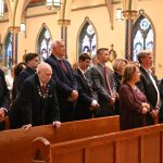 Morristown Knights honored for their selfless gift of service #Catholic – The sense of celebration was palpable on Oct. 10 at Assumption Church in Morristown. N.J. members of the&nbsp;Knights of Columbus George Washington Council No. 359 filled the pews.
Bishop Kevin J. Sweeney joined about 300 knights, spouses and other family members to celebrate the council’s annual Mass to mark the beginning of its fraternal year. The liturgy was followed by a dinner of appreciation honoring service and compassion throughout the community at Morris County Golf Club in Morris Township. The council, which recently added nine young men, is one of the oldest knight groups in the United States.
“It’s a great blessing to see the inspiration of women and men of faith who serve, lead, and help us as disciples of our Lord Jesus to put our faith into action,” Bishop Sweeney said at the Mass.
George Washington Council is the only one in the U.S. not named after a Catholic; instead, it was named after the Revolutionary War general and first U.S. president. Morristown is known as the military capital of the Revolution, where Washington and the Continental Army wintered during the war.

Click here to subscribe to our weekly newsletter.

The council began at a time of strong anti-Catholic sentiment. Yet the council has always supported patriotism and been engaged in community service.
The council typically raises at least ,000 each year for local charities, which Knights trustee John Wooters said is focused on people on the margins facing challenges ranging from food and housing to mental health issues. But he said time and talent are as much of a compassionate asset to the community as their financial contribution.
“It’s also manpower. We are probably doing something at least twice a week at some different organization, whether it’s moving medical supplies and medical beds so that they can be put on a container to go to Ukraine, or taking care of somebody who’s involved with [domestic] abuse. We have to move the family,” Wooters said.
The knights’ financial and volunteer support spans from ArcMorris, helping people with disabilities, to performing tasks for the&nbsp;Discalced Carmelites of the Most Blessed Virgin Mary of Mount Carmel.
Msgr. John Hart, pastor of Assumption, a fourth-degree knight, and the council’s chaplain, said the call to service stems from the faith of these men of diverse ages, backgrounds, and talents.
“It flows from who they are as Catholic men, Catholic gentlemen, as family men,” Msgr. John Hart said.
During the Oct. 10 dinner of appreciation, former grand knight and current trustee Bill Kostyak received the council’s Knight of the Year award. Carolyn Lake received the council’s Lifetime Achievement Award for her volunteer work with the Interfaith Food Pantry in Morris Plains.
The event is the council’s main fundraiser, which has given yearly honors to people from various circles of service, from the medical and education worlds to law enforcement.&nbsp;
During the Mass, Bishop Sweeney praised the award winners in his homily, citing examples of saints celebrating October feast days such as St. Carlo Acutis and St. Thérèse of Lisieux.
“The beauty of the lives of the saints, my sisters and brothers, is that they were normal people like us in so many ways, but they allowed themselves to fall in love with Jesus, to know Jesus in the sacraments, in prayer, and seeing him in our brothers and sisters who are in need,” Bishop Sweeney said. “To honor our honorees today, [we are] taking time to recognize the goodness, the generosity of those who respond to the Lord’s call.”
BEACON PHOTOS | JOE GIGLI
 [See image gallery at beaconnj.org] 
&nbsp;