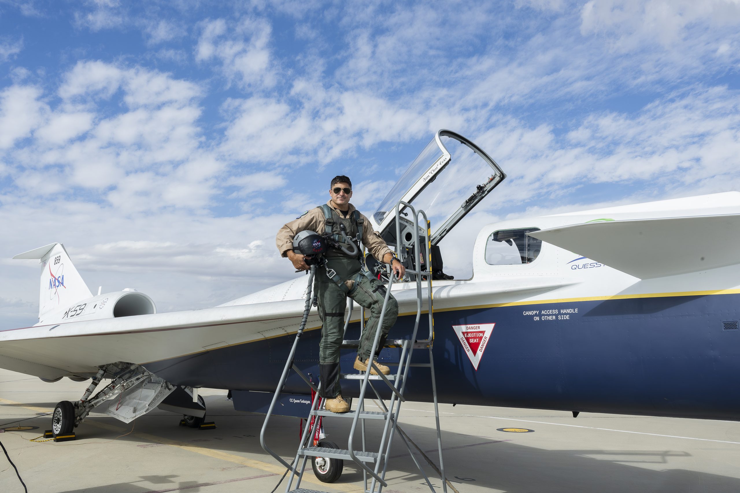 NASA’s X-59 Aircraft and Test Pilot – NASA test pilot Mike Lippert poses for a photo ahead of his first time flying the agency’s X-59 quiet supersonic research aircraft on Oct. 21, 2026.