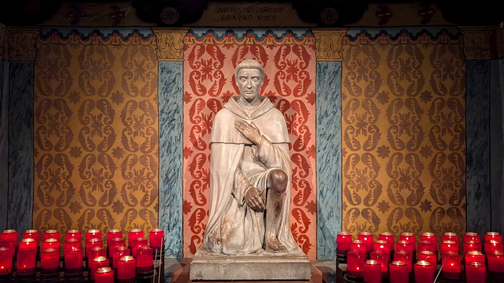 Who is St. Peregrine, the ‘cancer saint’ Catholics are invoking for Pope Leo XIV? #Catholic As Pope Leo XIV recovers at Rome’s Gemelli Hospital from surgery that confirmed lung cancer, Catholics around the world are praying for him, and many are turning to a 14th-century Servite priest long known as “the cancer saint”: St. Peregrine Laziosi.
 
 LIVE UPDATES: Pope Leo XIV diagnosed with lung cancer
 
 From punch to penanceAccording to an account by Father Lawrence G. Lovasik, SVD, published in EWTN’s library, Peregrine was born in 1260 in Forlì, Italy. He was the only son of a wealthy family, and as a young man he sided with the city’s anti-papal faction.When St. Philip Benizi of the Servants of Mary (the Servites) came to Forlì to preach peace on behalf of Pope Martin IV, he was met with insults, rocks, and clubs. Peregrine struck him in the face. Philip answered by offering the other cheek and praying for the young man.Moved, Peregrine ran after the departing friar. He begged forgiveness on his knees and promised to change his life. According to the traditional account, the Virgin Mary later appeared to him in Forlì’s cathedral and told him: “Go to Siena. There you will find the devout men who call themselves my servants. Join them.”Peregrine received the Servite habit in 1292. It was said that for 30 years he never sat down. In 1322, his superiors sent him to found a Servite house in his hometown of Forlì, where he became known as a preacher and a readily available confessor.The night before the amputationLater in life, Peregrine developed a painful cancerous wound on his foot. Lovasik writes that its “gangrenous stench” was so foul that others kept away. Surgeons decided to amputate.Peregrine spent the night before the operation in prayer before an image of the crucified Christ and fell asleep there. In a dream, Christ seemed to reach down from the cross and touch his diseased foot. When he awoke, he was healed. The account says the doctors could no longer find any trace of the disease.Peregrine died in 1345 at about 80 years of age. He was beatified in 1609, and Pope Benedict XIII canonized him in 1726. His feast is celebrated May 1. His body rests in the Basilica of San Pellegrino Laziosi in Forlì. Devotion to him has spread far beyond Italy, including to the National Shrine of St. Peregrine at Our Lady of Sorrows Basilica in Chicago, the city where Leo was born.Lovasik’s booklet includes several prayers, and EWTN offers a novena to St. Peregrine.